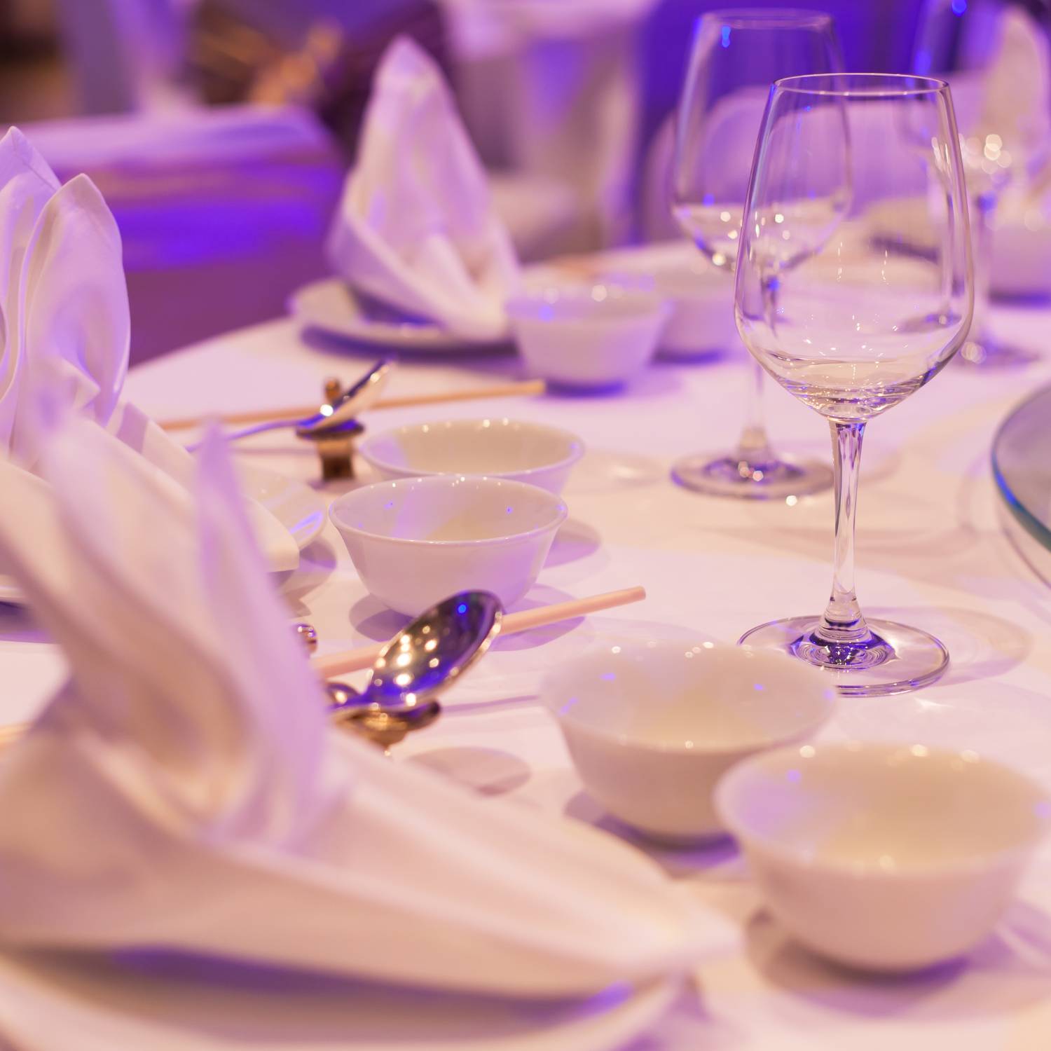 Plates, bowls and serving utensils on a table